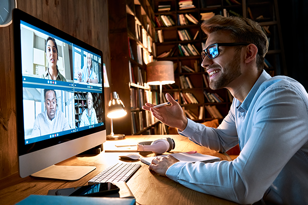 businessman-having-virtual-team-meeting-on-video-c-FKP2JAU